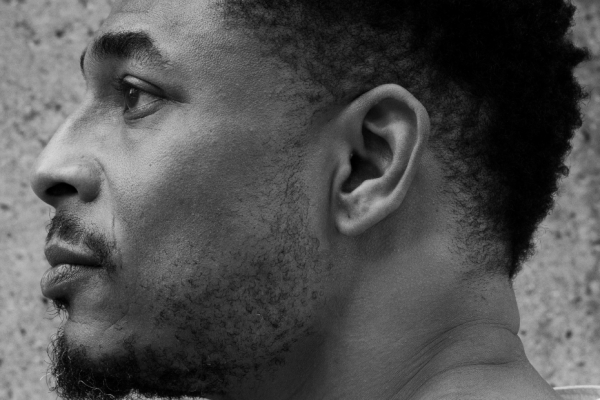 Close up of a man's side profile.