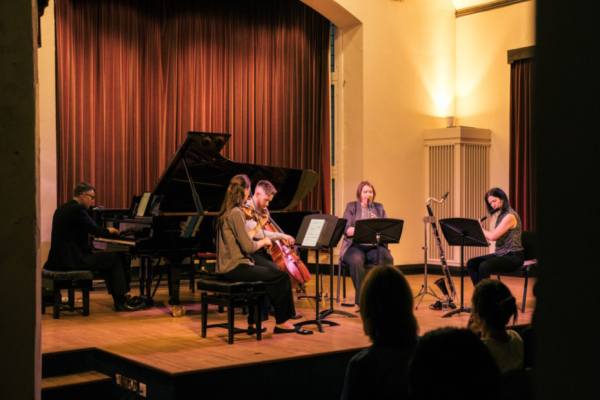 A group of musicians on stage.