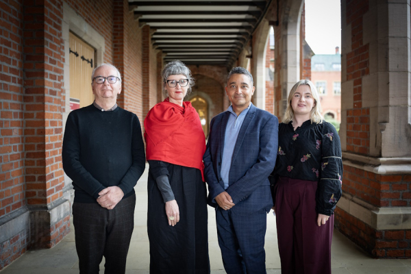 The speakers are pictured in the Quad at Queen's