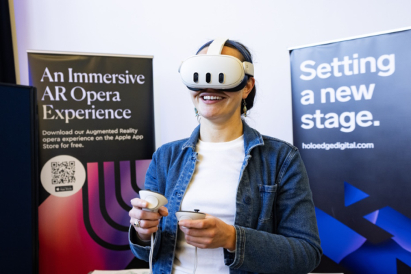 Pictured is a lady wearing an AR headset.