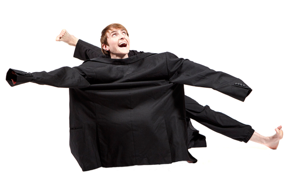 Dancers Maeve McGreevy & Adam Ashford performing wearing suits.