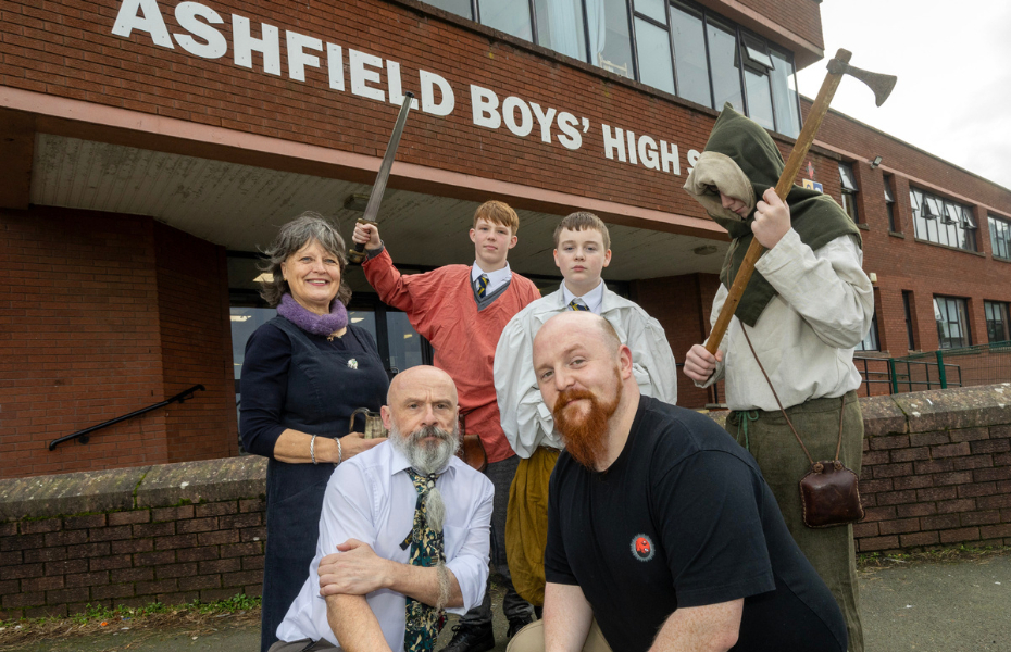 Pictured (L-R) are Marie O’Donoghue, Education Authority, Cliff McDuff Head of Politics, Ashfield Boys High School, Rob Crawford, artist, with pupils, Leon Carroll, Kalin Magill and Kai McFerran.