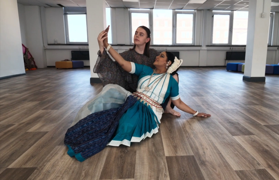 two women embraced in a dance