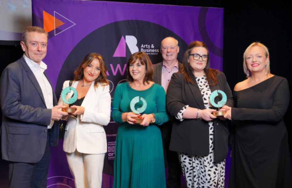 Group of six people holding Arts and Business Northern Ireland Awards 2024