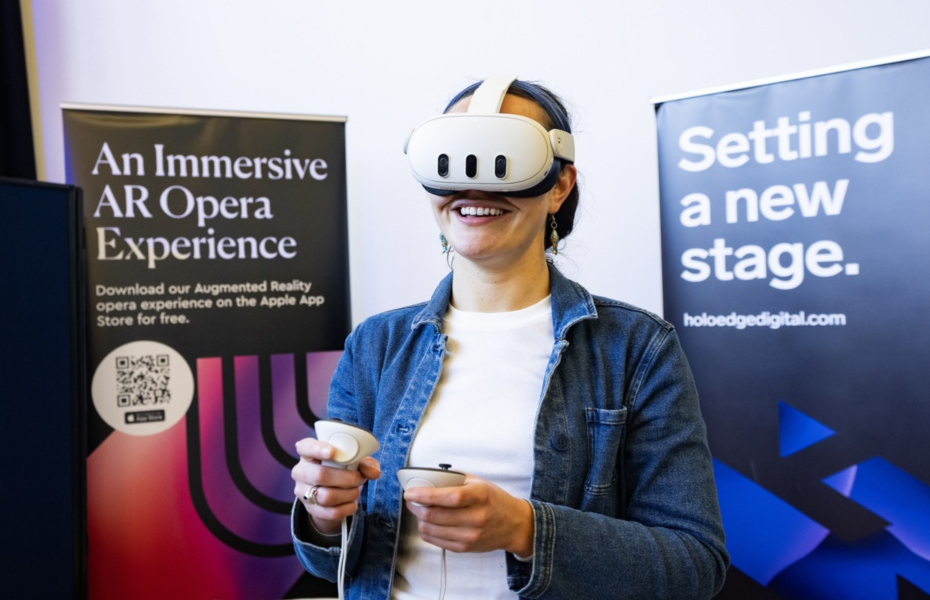 Pictured is a lady wearing an AR headset.