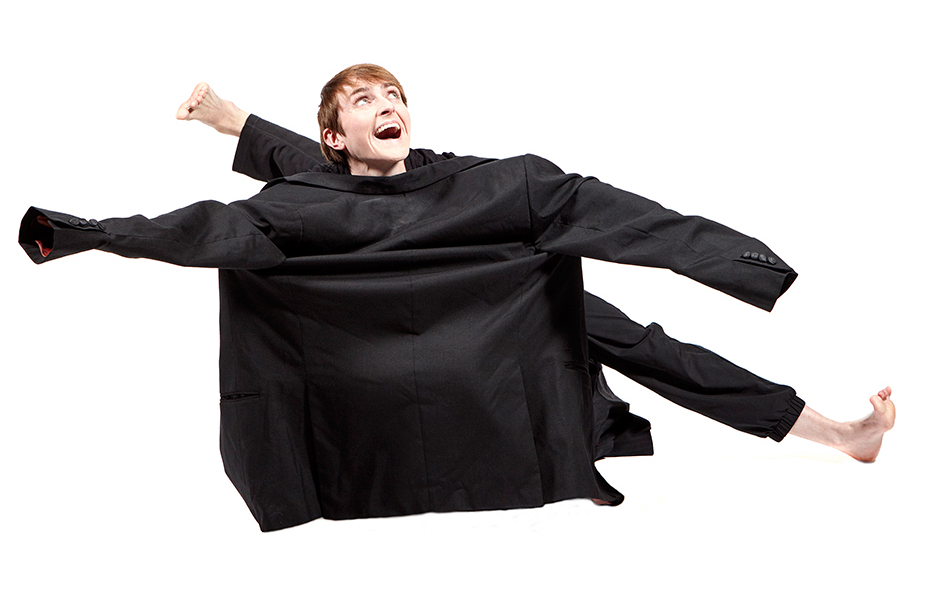 Dancers Maeve McGreevy & Adam Ashford performing wearing suits.